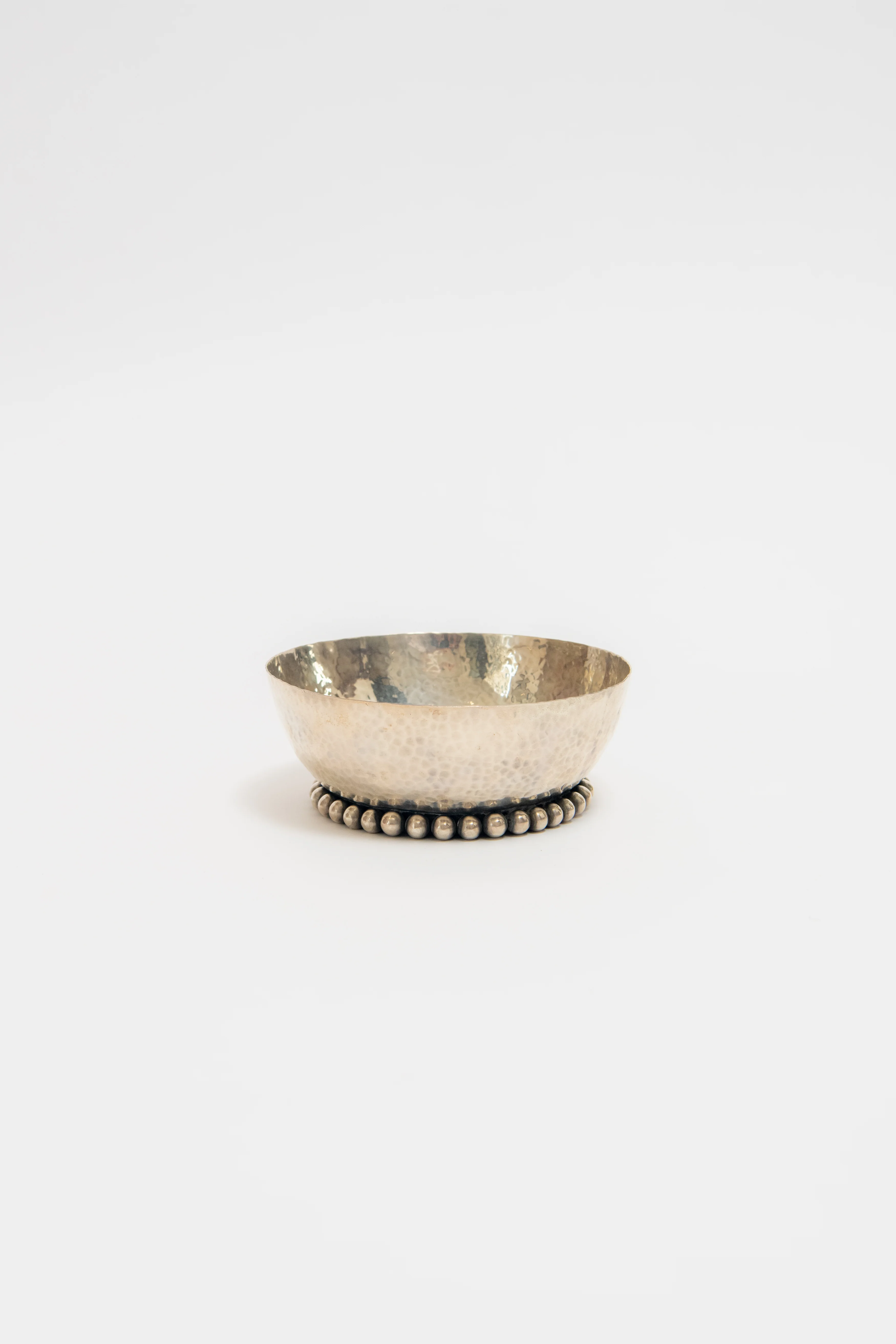 JEAN DÉSPRES, HAMMERED SILVER BOWL, C. 1930